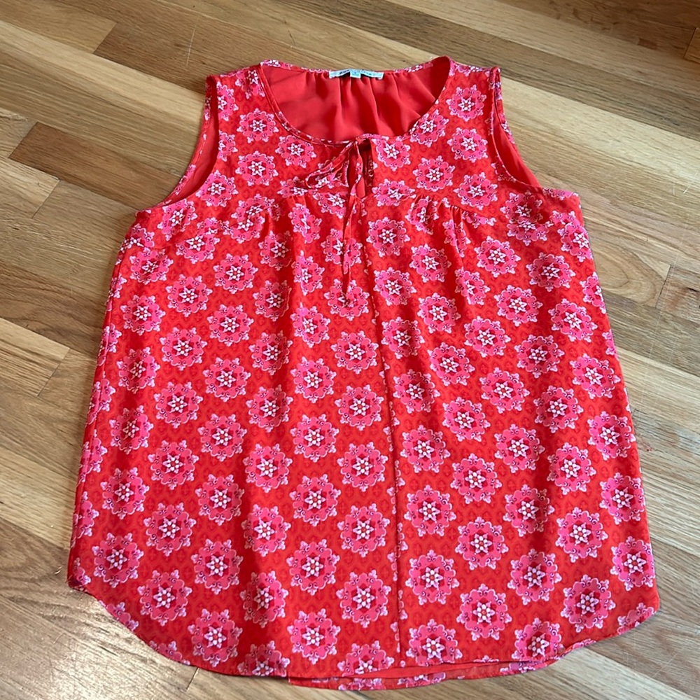 Gently worn women’s top by rose and Olive size small